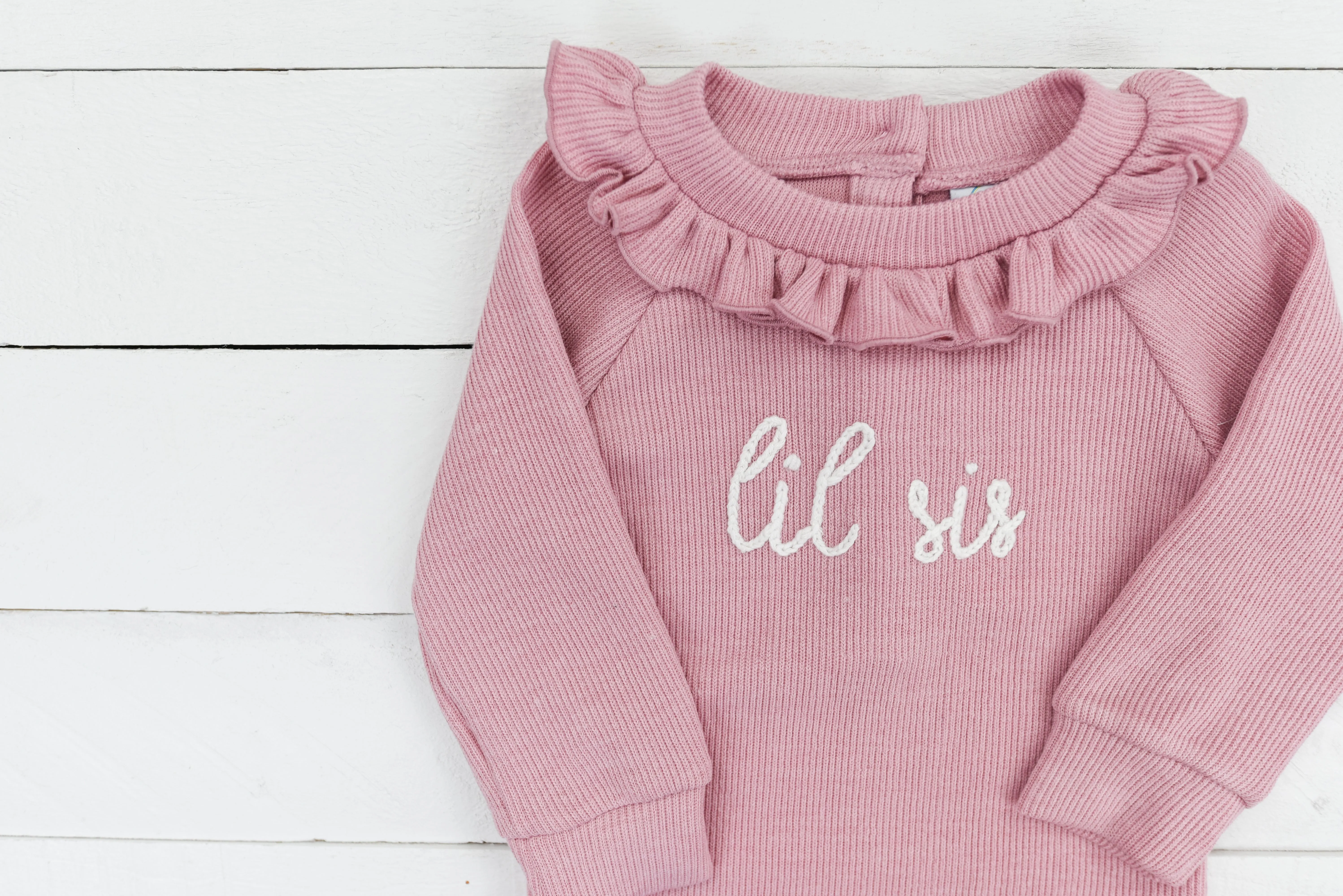 Chainstitch Pink sweater onesie